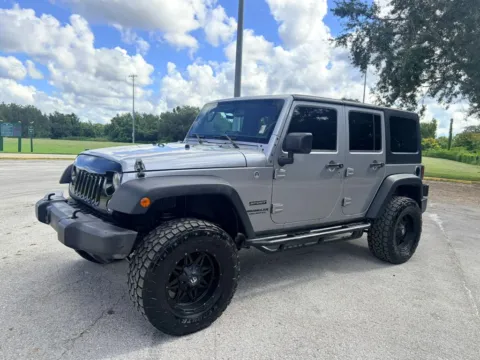 Photos of 2016 Jeep Wrangler Unlimited Sport SUV 4D for sale in Orlando, FL at Winter Park Auto Exchange