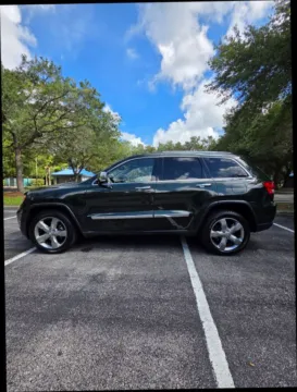 Photos of 2011 Jeep Grand Cherokee Overland Sport Utility 4D for sale in Orlando, FL at Winter Park Auto Exchange