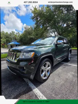 Blue 2011 Jeep Grand Cherokee Overland Sport Utility 4D for sale in Orlando, FL