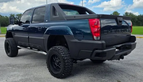 Another view of 2005 Chevrolet Avalanche 1500 LT Sport Utility Pickup 4D 5 1/4 ft for sale in Orlando, FL at Winter Park Auto Exchange