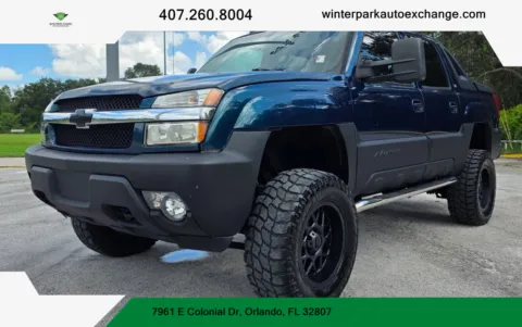 Red 2005 Chevrolet Avalanche 1500 LT Sport Utility Pickup 4D 5 1/4 ft for sale in Orlando, FL
