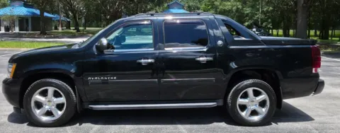 Photos of 2013 Chevrolet Avalanche Black Diamond LT Sport Utility Pickup 4D 5 1/4 ft for sale in Orlando, FL at Winter Park Auto Exchange