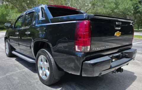 Another view of 2013 Chevrolet Avalanche Black Diamond LT Sport Utility Pickup 4D 5 1/4 ft for sale in Orlando, FL at Winter Park Auto Exchange