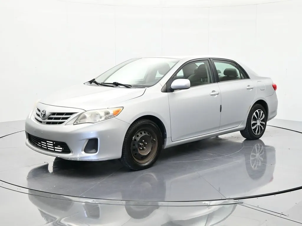 Silver 2013 Toyota Corolla LE for sale in Palatka, FL