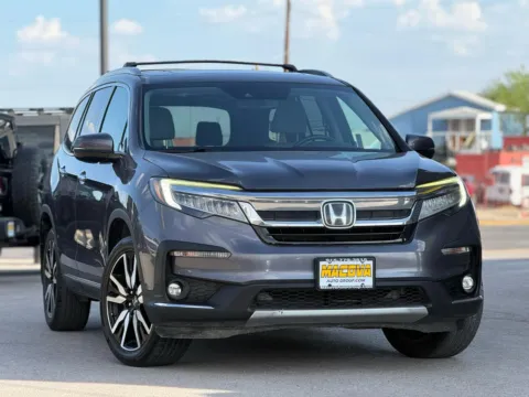 Photos of 2019 Honda Pilot Touring w/Rear Captain's Chairs for sale in El Paso, TX at Macova Auto Group Inc.
