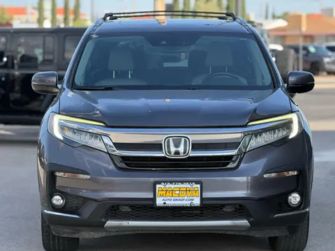 Another view of 2019 Honda Pilot Touring w/Rear Captain's Chairs for sale in El Paso, TX at Macova Auto Group Inc.
