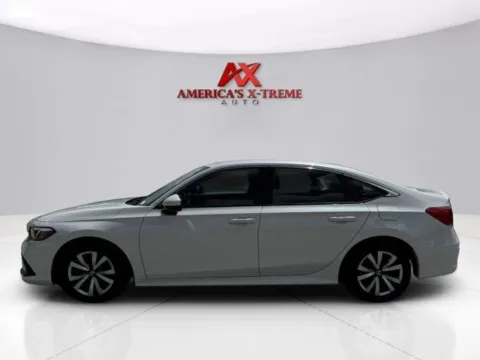 Photos of 2024 Honda Civic Sedan LX for sale in Houston, TX at America's Xtreme Auto Sales & Auto Repair | Luxury Used Cars & Trucks Dealership