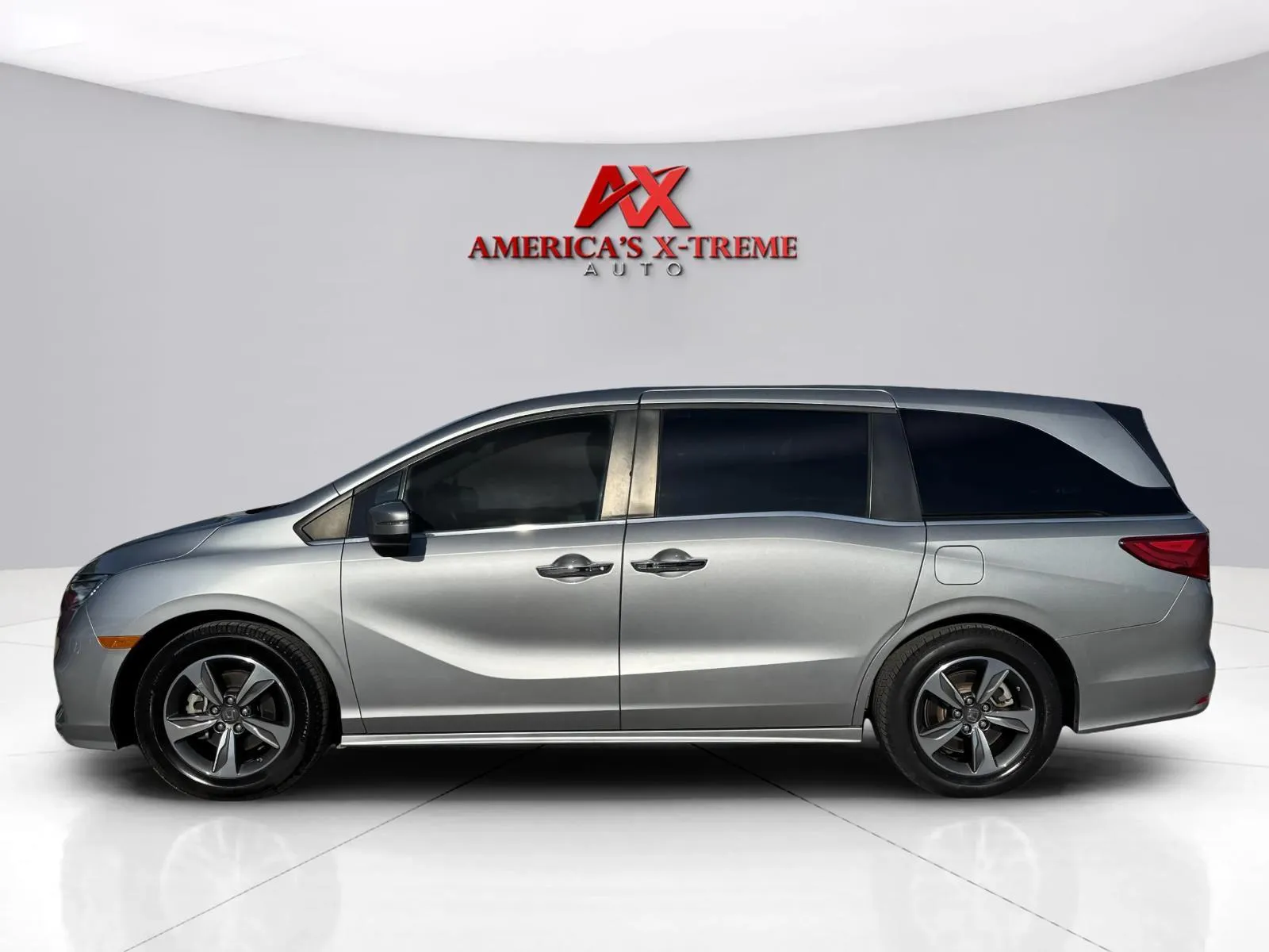 Photos of 2019 Honda Odyssey Touring for sale in Houston, TX at America's Xtreme Auto Sales & Auto Repair | Luxury Used Cars & Trucks Dealership