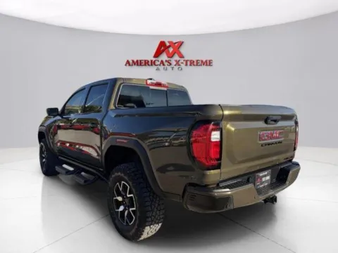 Another view of 2024 GMC Canyon 4WD AT4X for sale in Houston, TX at America's Xtreme Auto Sales & Auto Repair | Luxury Used Cars & Trucks Dealership