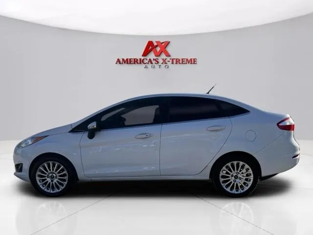 Photos of 2014 Ford Fiesta Titanium for sale in Houston, TX at America's Xtreme Auto Sales & Auto Repair | Luxury Used Cars & Trucks Dealership