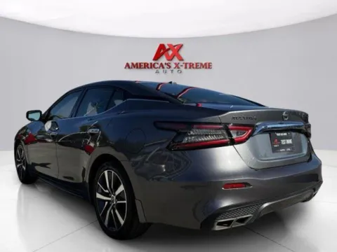 Another view of 2019 Nissan Maxima S for sale in Houston, TX at America's Xtreme Auto Sales & Auto Repair | Luxury Used Cars & Trucks Dealership