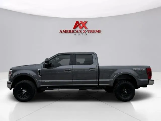 Photos of 2022 Ford Super Duty F-250 SRW LARIAT for sale in Houston, TX at America's Xtreme Auto Sales & Auto Repair | Luxury Used Cars & Trucks Dealership
