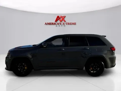 Photos of 2021 Jeep Grand Cherokee Trackhawk for sale in Houston, TX at America's Xtreme Auto Sales & Auto Repair | Luxury Used Cars & Trucks Dealership