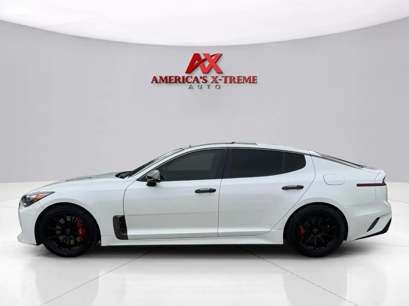 Photos of 2021 Kia Stinger GT1 for sale in Houston, TX at America's Xtreme Auto Sales & Auto Repair | Luxury Used Cars & Trucks Dealership