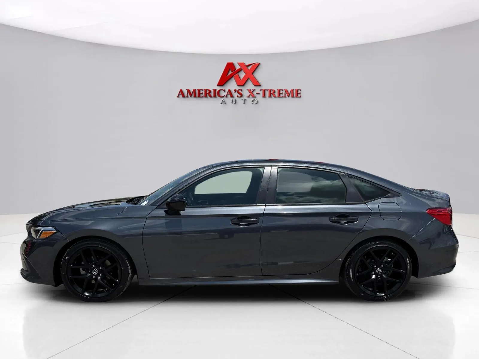 Photos of 2023 Honda Civic Sedan Sport for sale in Houston, TX at America's Xtreme Auto Sales & Auto Repair | Luxury Used Cars & Trucks Dealership