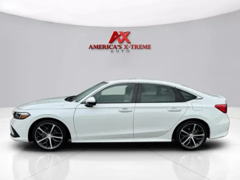 Photos of 2024 Honda Civic Sedan Touring for sale in Houston, TX at America's Xtreme Auto Sales & Auto Repair | Luxury Used Cars & Trucks Dealership