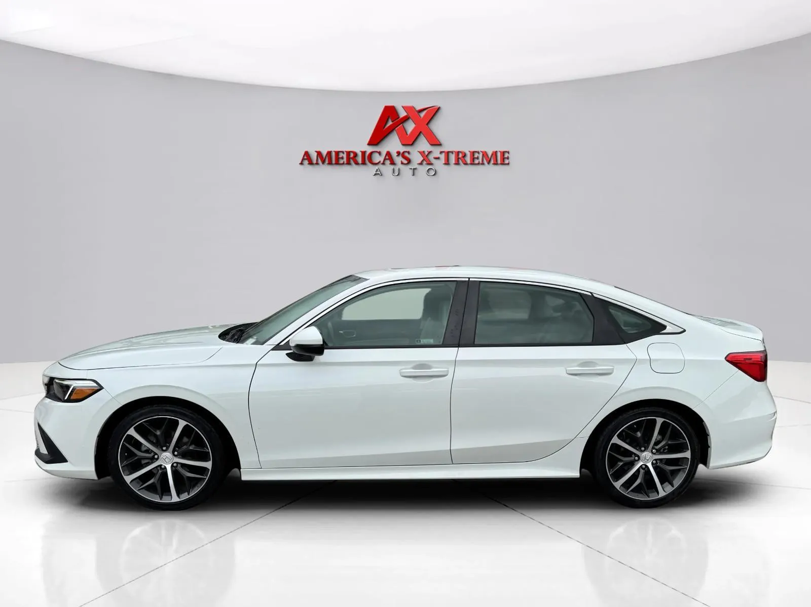 Photos of 2024 Honda Civic Sedan Touring for sale in Houston, TX at America's Xtreme Auto Sales & Auto Repair | Luxury Used Cars & Trucks Dealership