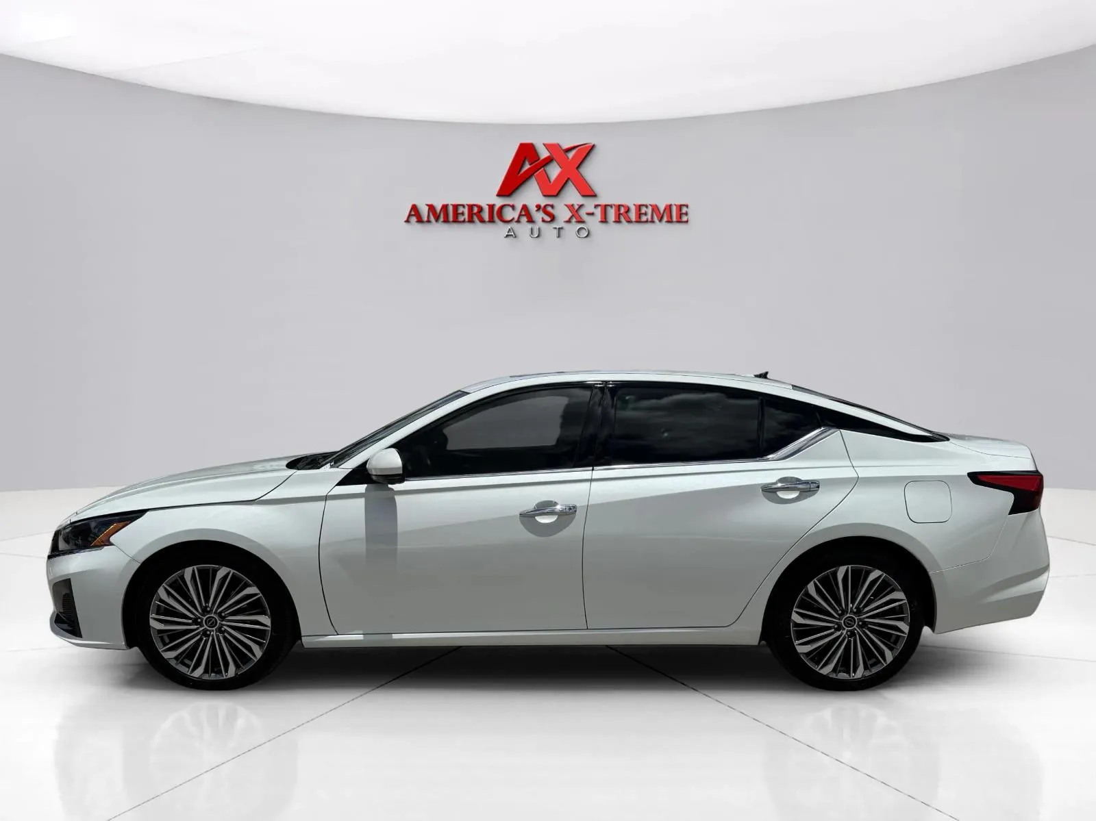 Photos of 2023 Nissan Altima 2.5 SL for sale in Houston, TX at America's Xtreme Auto Sales & Auto Repair | Luxury Used Cars & Trucks Dealership