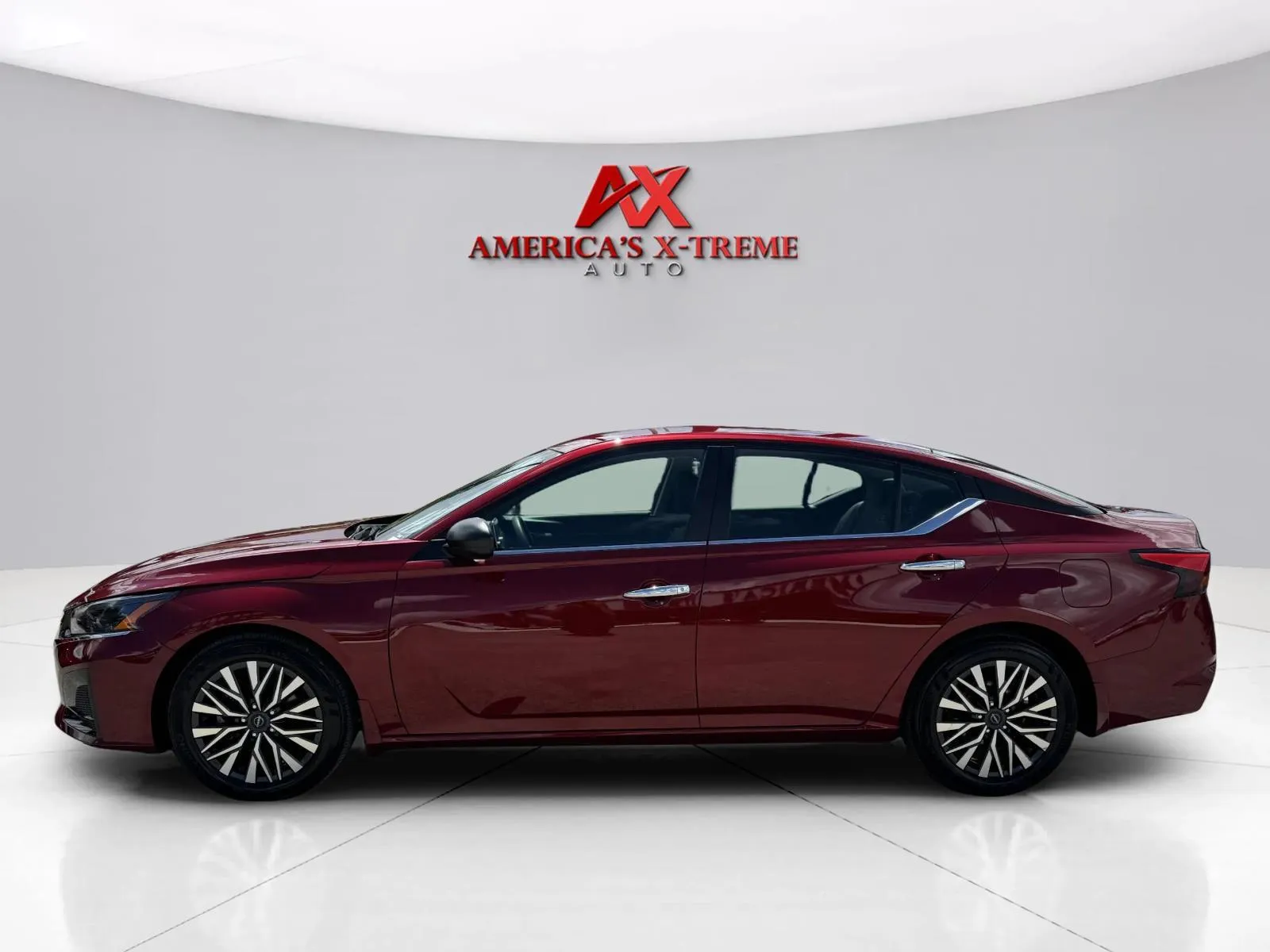 Photos of 2024 Nissan Altima 2.5 SV for sale in Houston, TX at America's Xtreme Auto Sales & Auto Repair | Luxury Used Cars & Trucks Dealership
