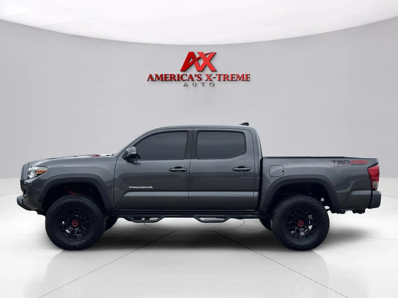 Photos of 2017 Toyota Tacoma TRD Off-Road for sale in Houston, TX at America's Xtreme Auto Sales & Auto Repair | Luxury Used Cars & Trucks Dealership