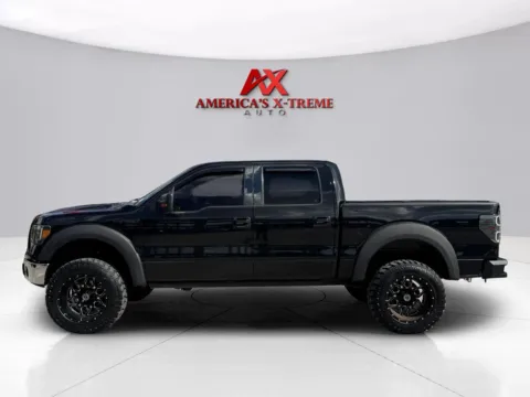 Photos of 2013 Ford F-150 XLT for sale in Houston, TX at America's Xtreme Auto Sales & Auto Repair | Luxury Used Cars & Trucks Dealership