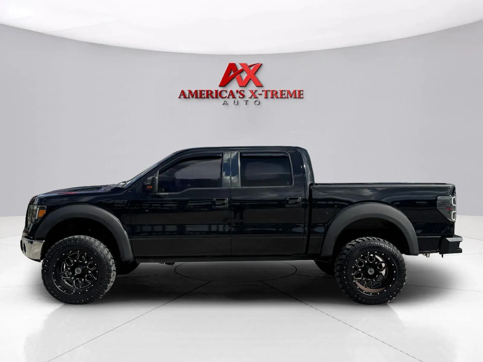 Photos of 2013 Ford F-150 XLT for sale in Houston, TX at America's Xtreme Auto Sales & Auto Repair | Luxury Used Cars & Trucks Dealership