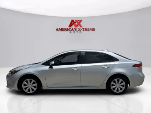 Photos of 2021 Toyota Corolla LE for sale in Houston, TX at America's Xtreme Auto Sales & Auto Repair | Luxury Used Cars & Trucks Dealership