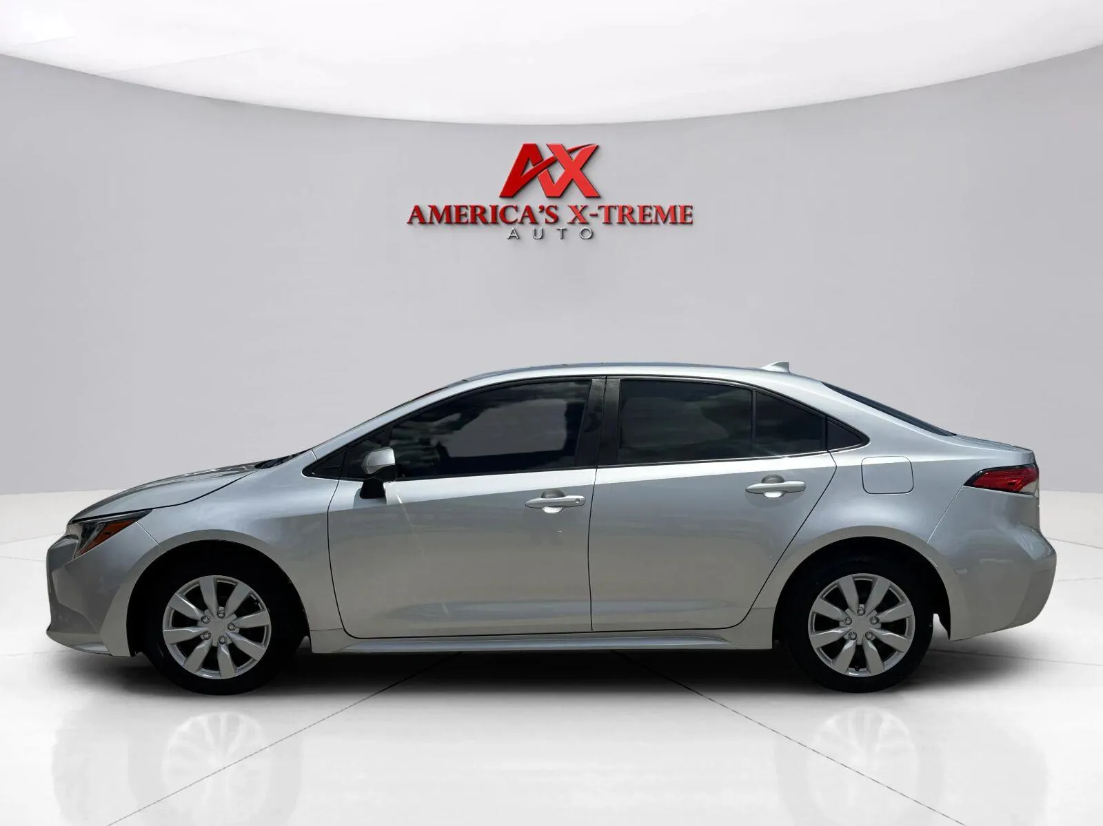 Photos of 2021 Toyota Corolla LE for sale in Houston, TX at America's Xtreme Auto Sales & Auto Repair | Luxury Used Cars & Trucks Dealership