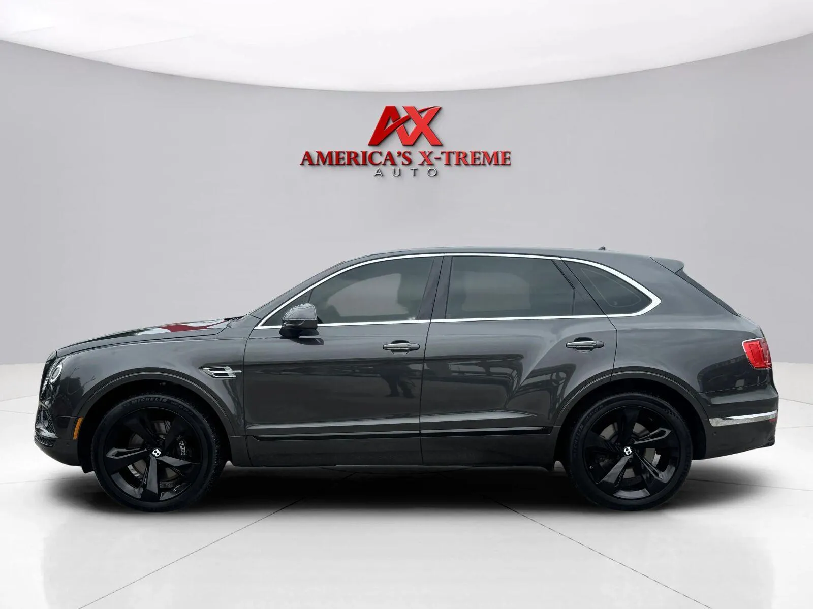 Photos of 2018 Bentley Bentayga W12 Onyx Edition for sale in Houston, TX at America's Xtreme Auto Sales & Auto Repair | Luxury Used Cars & Trucks Dealership