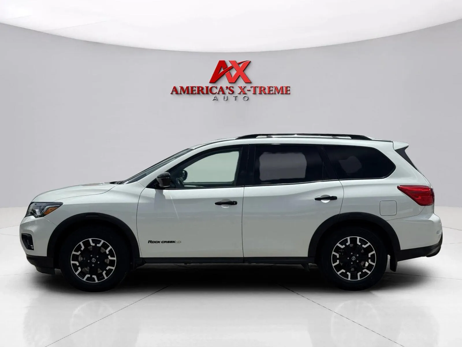Photos of 2020 Nissan Pathfinder SV for sale in Houston, TX at America's Xtreme Auto Sales & Auto Repair | Luxury Used Cars & Trucks Dealership