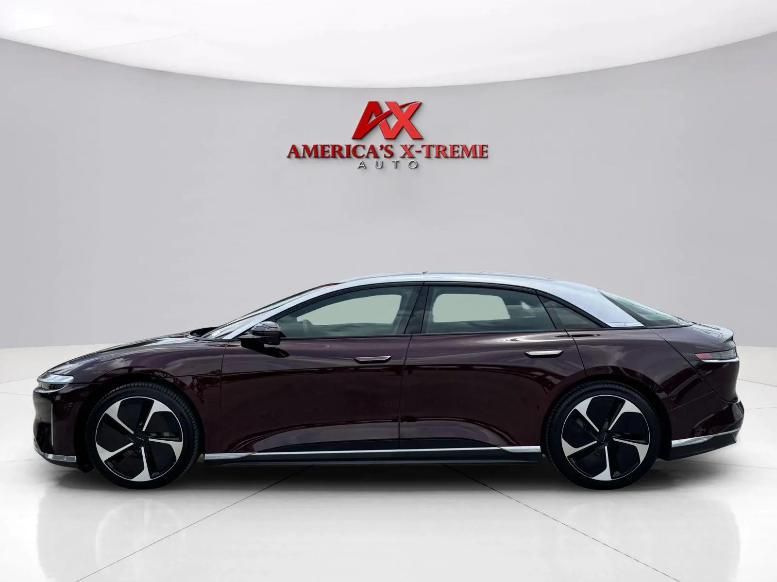 Photos of 2025 Lucid Air Touring for sale in Houston, TX at America's Xtreme Auto Sales & Auto Repair | Luxury Used Cars & Trucks Dealership