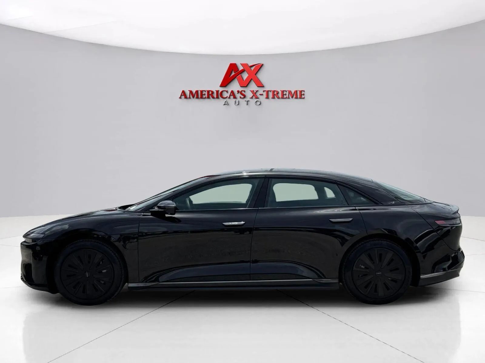 Photos of 2025 Lucid Air Pure for sale in Houston, TX at America's Xtreme Auto Sales & Auto Repair | Luxury Used Cars & Trucks Dealership