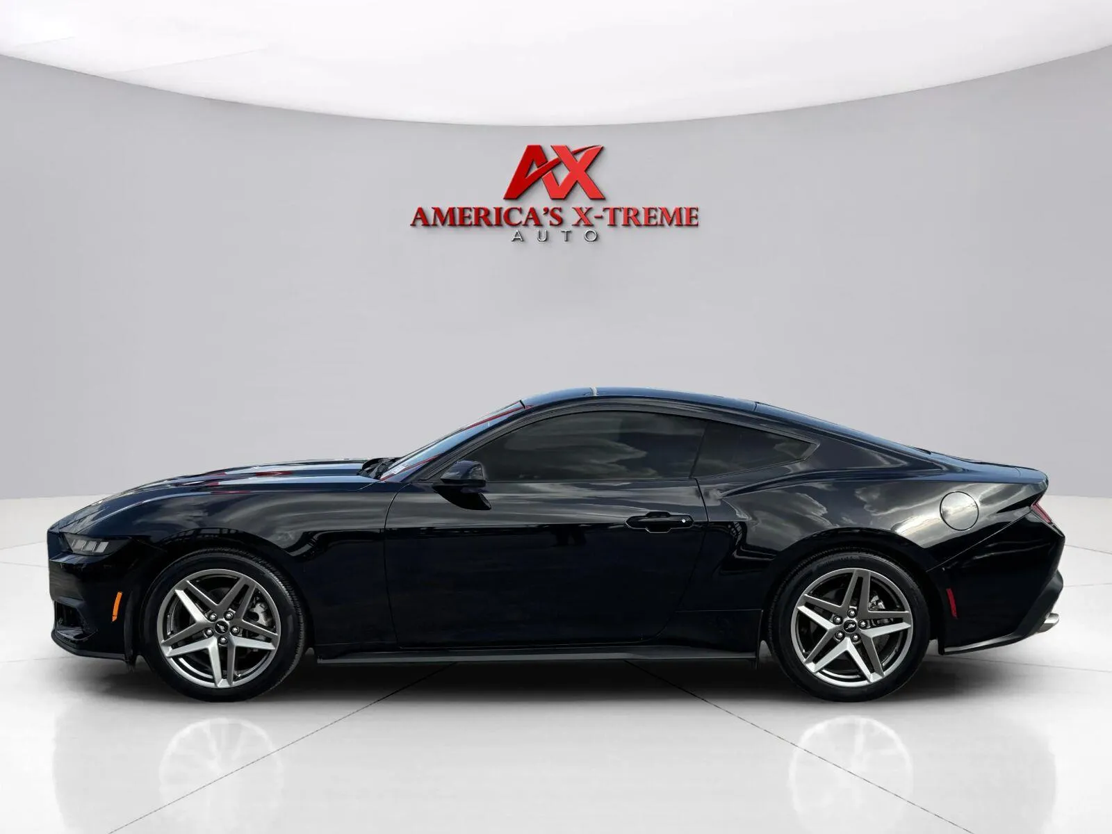 Photos of 2024 Ford Mustang EcoBoost for sale in Houston, TX at America's Xtreme Auto Sales & Auto Repair | Luxury Used Cars & Trucks Dealership