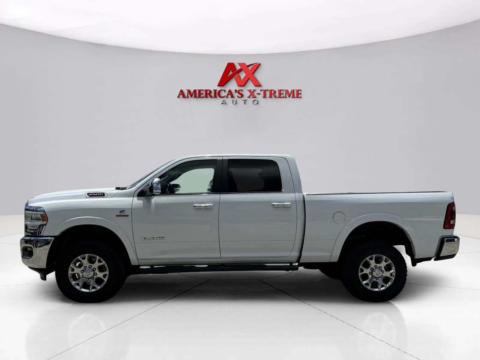 Photos of 2021 Ram 2500 Laramie for sale in Houston, TX at America's Xtreme Auto Sales & Auto Repair | Luxury Used Cars & Trucks Dealership