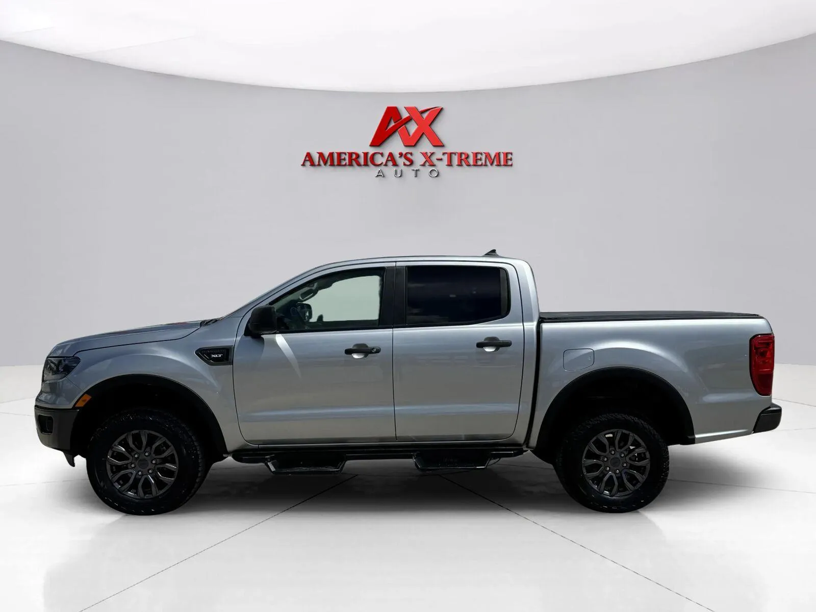 Photos of 2021 Ford Ranger XLT for sale in Houston, TX at America's Xtreme Auto Sales & Auto Repair | Luxury Used Cars & Trucks Dealership