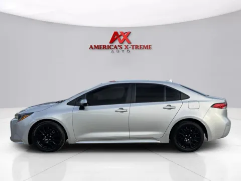 Photos of 2023 Toyota Corolla LE for sale in Houston, TX at America's Xtreme Auto Sales & Auto Repair | Luxury Used Cars & Trucks Dealership