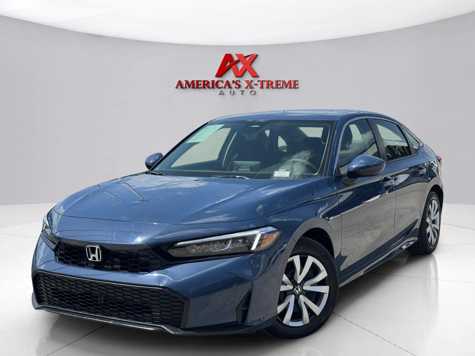 Blue 2026 Honda Civic Sedan LX for sale in Houston, TX