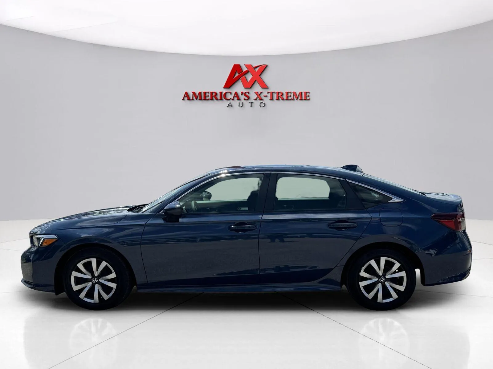 Photos of 2026 Honda Civic Sedan LX for sale in Houston, TX at America's Xtreme Auto Sales & Auto Repair | Luxury Used Cars & Trucks Dealership