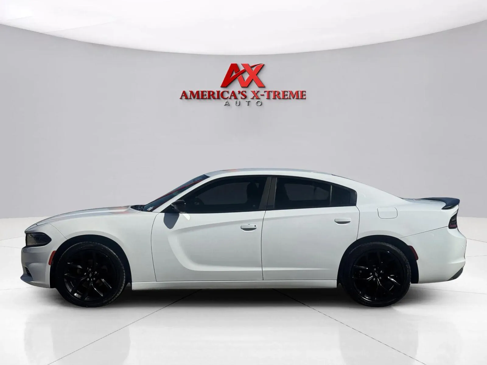 Photos of 2019 Dodge Charger SXT for sale in Houston, TX at America's Xtreme Auto Sales & Auto Repair | Luxury Used Cars & Trucks Dealership