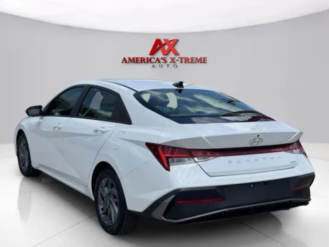 Another view of 2024 Hyundai Elantra Hybrid Blue for sale in Houston, TX at America's Xtreme Auto Sales & Auto Repair | Luxury Used Cars & Trucks Dealership
