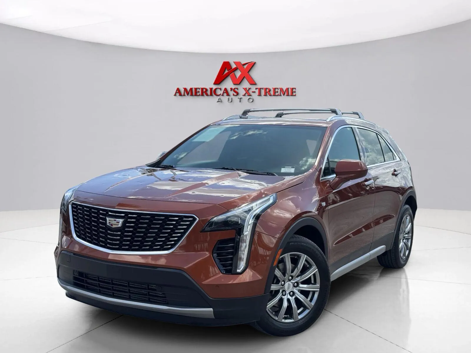 Orange 2019 Cadillac XT4 AWD Premium Luxury for sale in Houston, TX