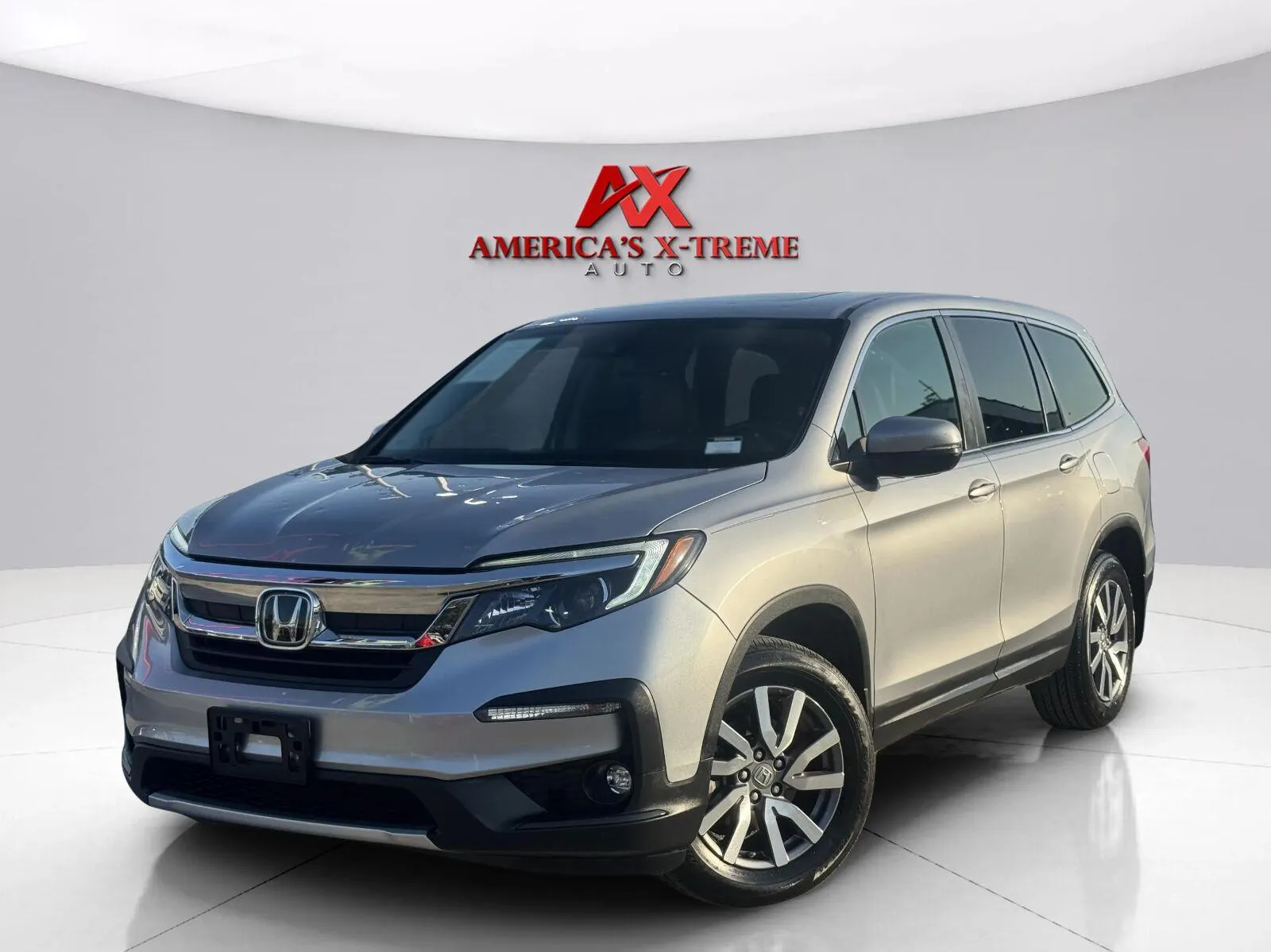Silver 2019 Honda Pilot EX-L for sale in Houston, TX