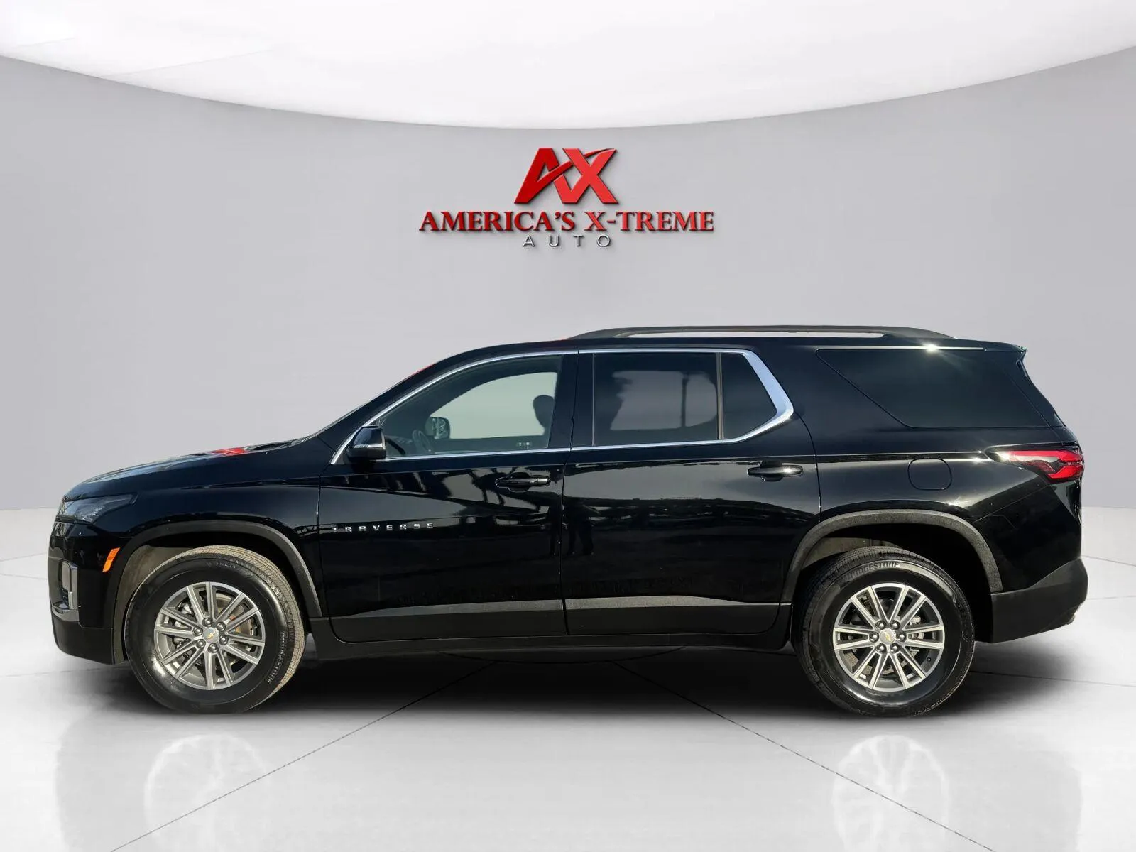 Photos of 2022 Chevrolet Traverse LT Cloth for sale in Houston, TX at America's Xtreme Auto Sales & Auto Repair | Luxury Used Cars & Trucks Dealership