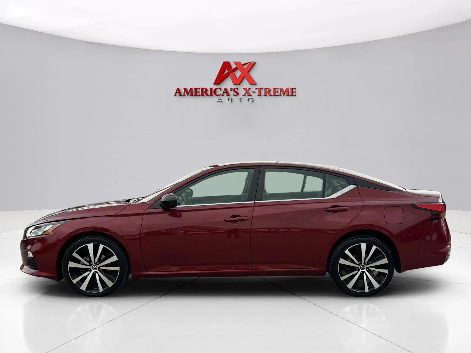 Photos of 2022 Nissan Altima 2.5 SR for sale in Houston, TX at America's Xtreme Auto Sales & Auto Repair | Luxury Used Cars & Trucks Dealership