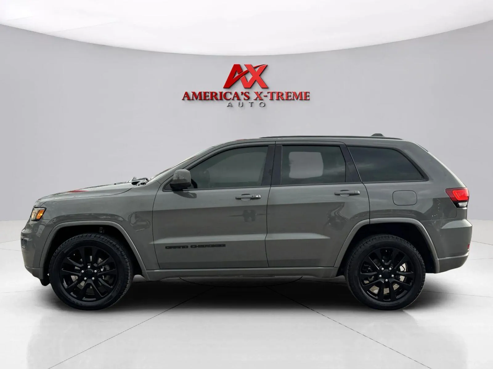 Photos of 2020 Jeep Grand Cherokee Altitude for sale in Houston, TX at America's Xtreme Auto Sales & Auto Repair | Luxury Used Cars & Trucks Dealership
