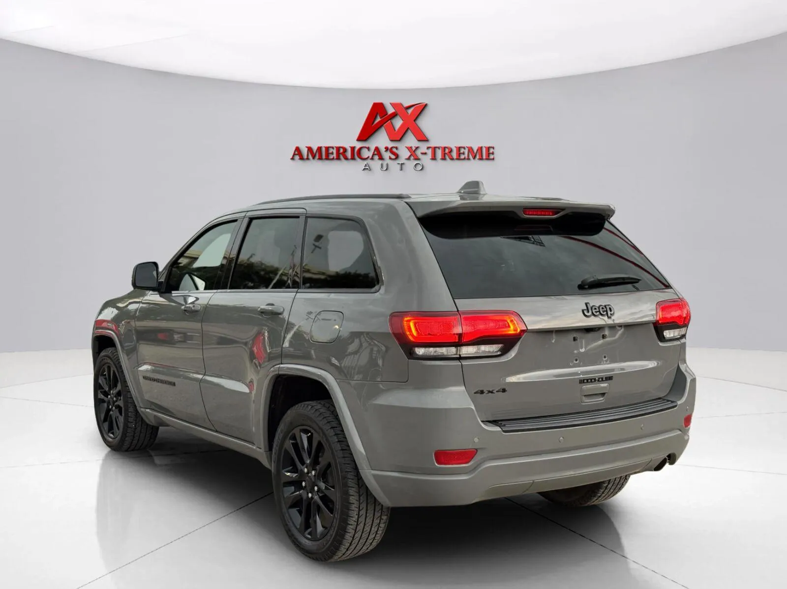 Another view of 2020 Jeep Grand Cherokee Altitude for sale in Houston, TX at America's Xtreme Auto Sales & Auto Repair | Luxury Used Cars & Trucks Dealership
