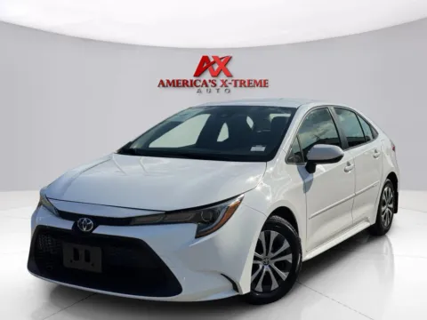 White 2022 Toyota Corolla Hybrid LE for sale in Houston, TX