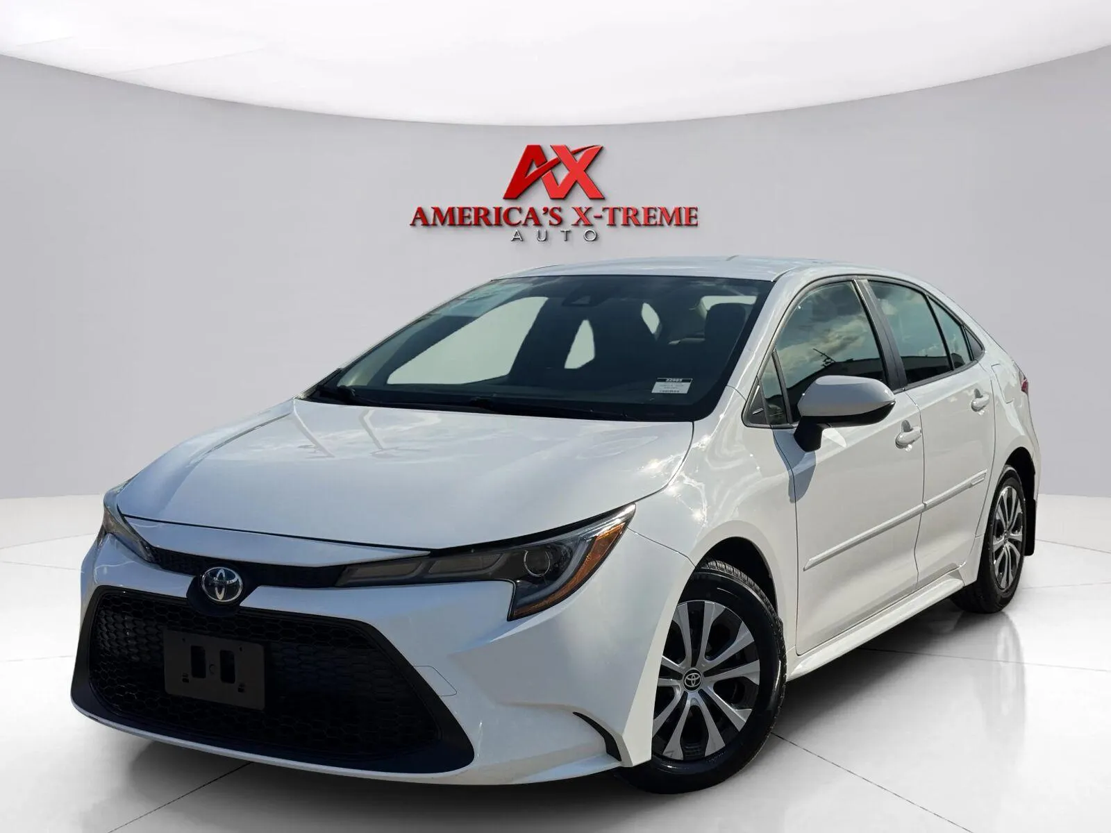 White 2022 Toyota Corolla Hybrid LE for sale in Houston, TX
