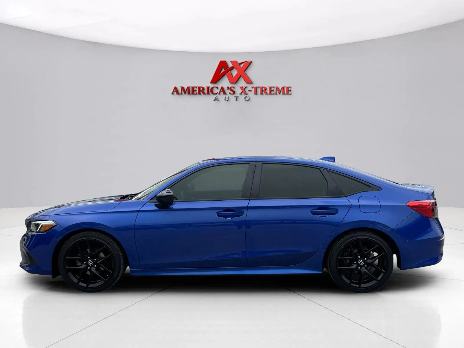Photos of 2023 Honda Civic Sport for sale in Houston, TX at America's Xtreme Auto Sales & Auto Repair | Luxury Used Cars & Trucks Dealership