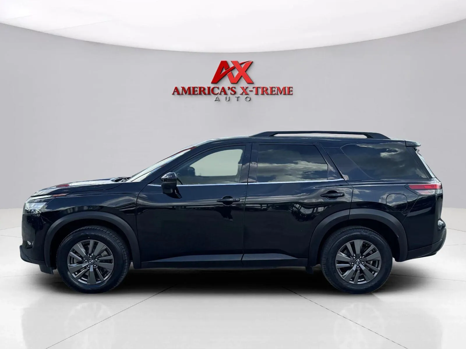 Photos of 2022 Nissan Pathfinder SV for sale in Houston, TX at America's Xtreme Auto Sales & Auto Repair | Luxury Used Cars & Trucks Dealership